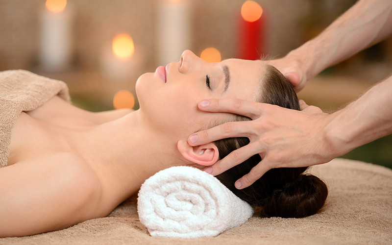 Beautiful Brunette Woman Taking Head Massage 800X500